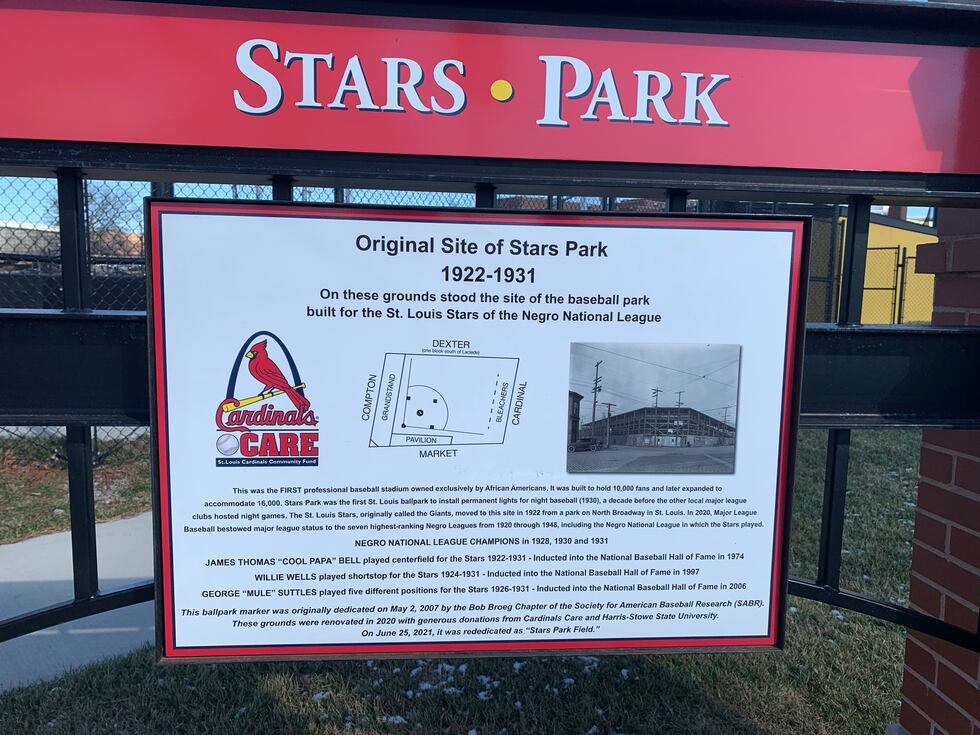 A sign right outside Stars Park depicting its history and the 2021 rededication of the field...