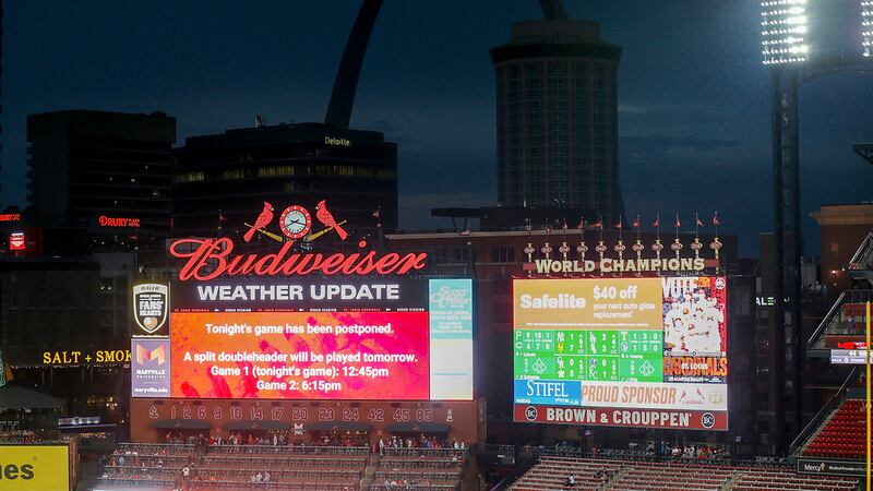 A screen indicates that a baseball game between the St. Louis Cardinals and the Atlanta Braves...