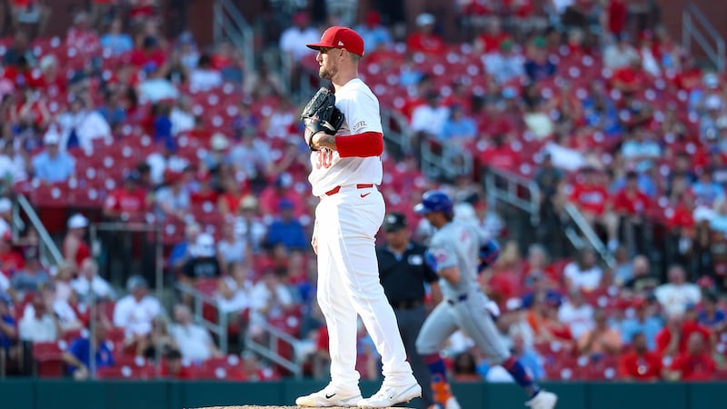 St. Louis Cardinals relief pitcher Shawn Armstrong pauses on the mound after giving up a solo...
