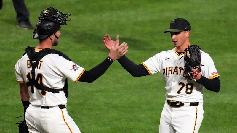 Pittsburgh Pirates pitcher Thomas Harrington (78) celebrates with catcher Joey Bart, left,...