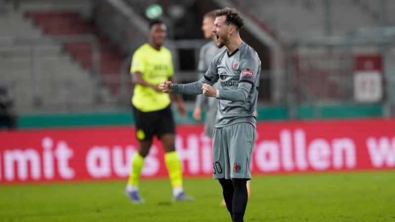 ST. Pauli's Marcel Hartel jubilates at the en of the German Soccer Cup round of 16 soccer...