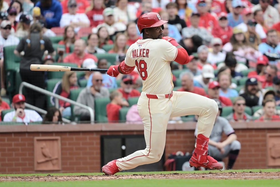 St. Louis Cardinals' Jordan Walker (18) hits a single during the fourth inning of a baseball...