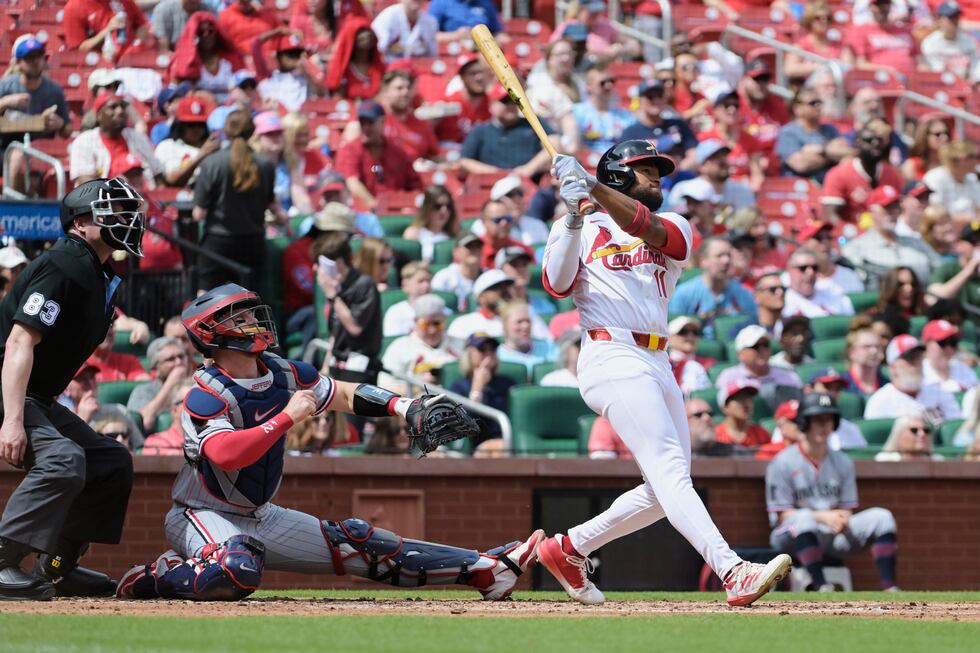 St. Louis Cardinals outfielder Victor Scott II, right, hits a two-run home run during the...
