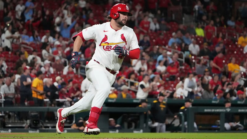 St. Louis Cardinals' Alec Burleson rounds first on his way to a two-run double during the...