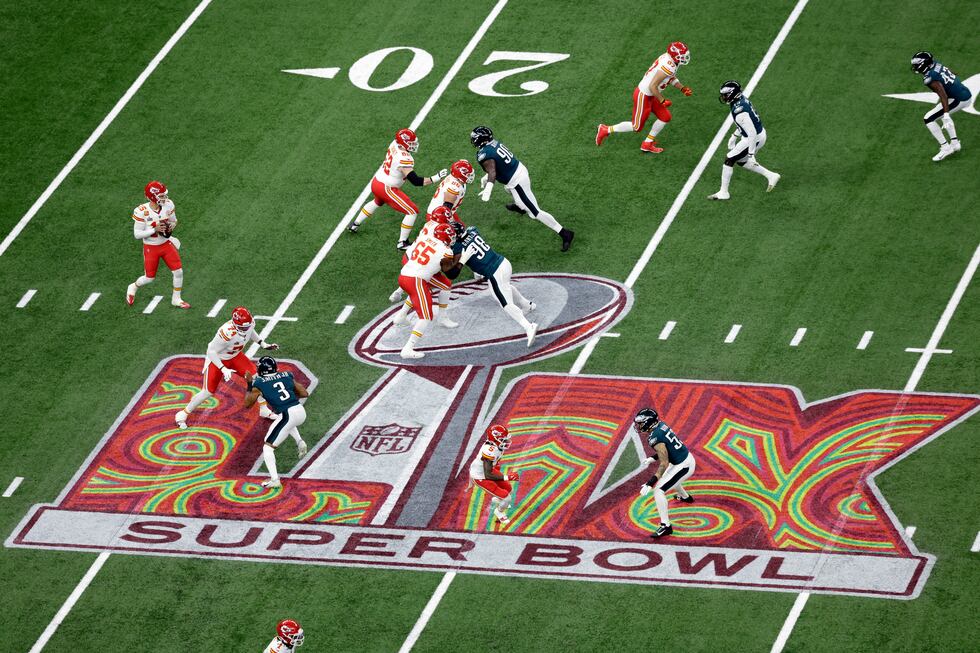 FILE - Kansas City Chiefs quarterback Patrick Mahomes (15) looks to the ball during the...