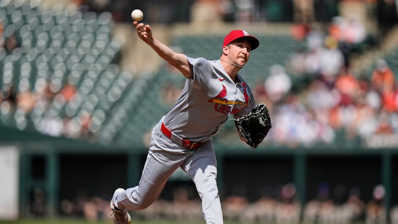 St. Louis Cardinals starting pitcher Erick Fedde delivers during the first inning of a...