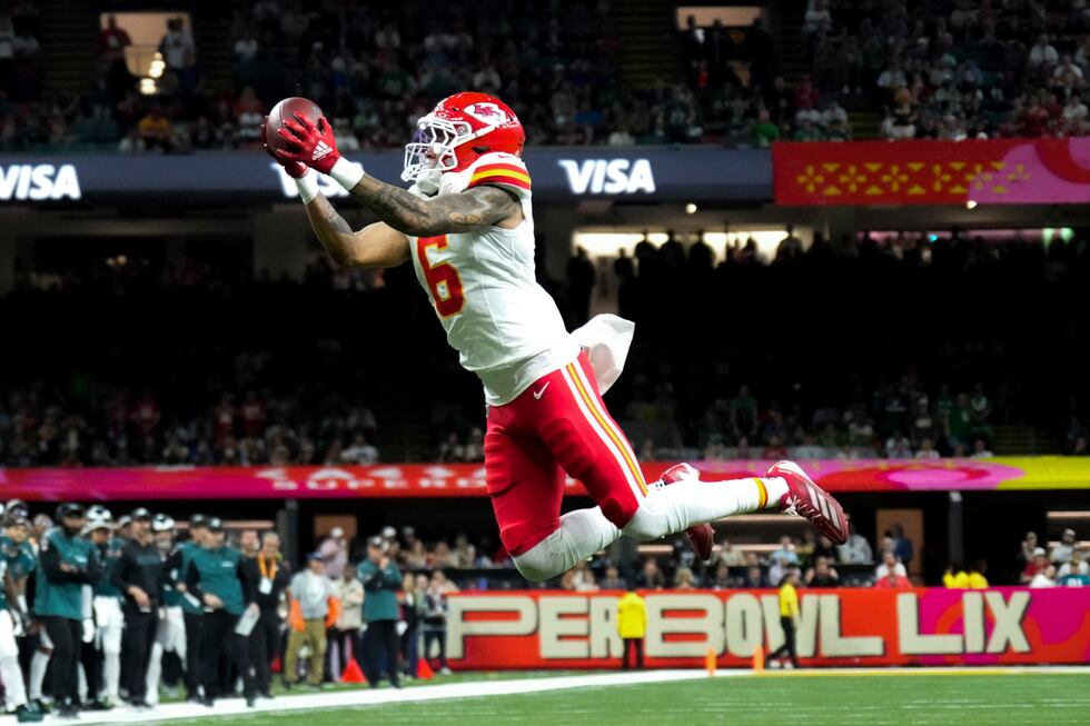 Kansas City Chiefs safety Bryan Cook (6) intercepts a during the first half of the NFL...