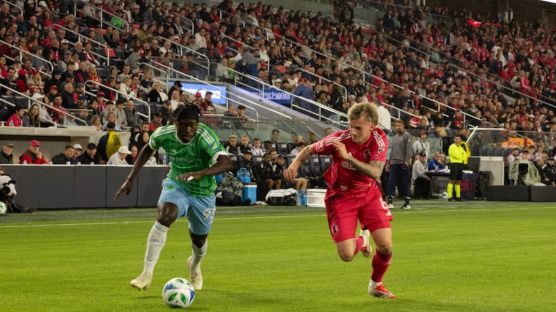 CITY SC's Conrad Wallem chasing a Seattle Sounder's player on March 15.