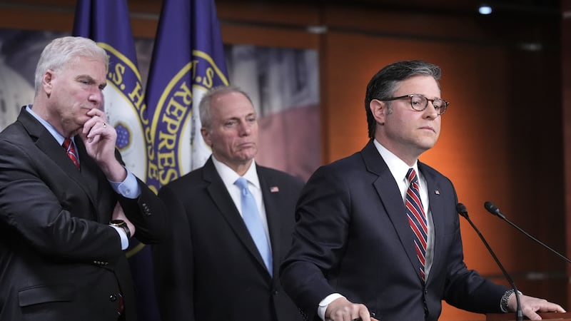 FILE - Speaker of the House Mike Johnson, R-La., ed from left by House Majority Whip Tom...