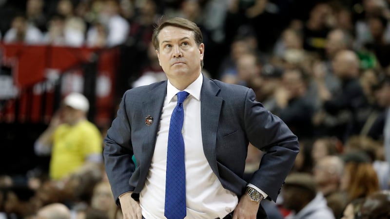 Saint Louis head coach Travis Ford looks on during the first half of an NCAA college...