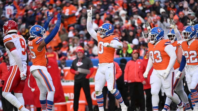 Denver Broncos outside linebacker Jonathon Cooper (0) celebrates after sacking Kansas City...
