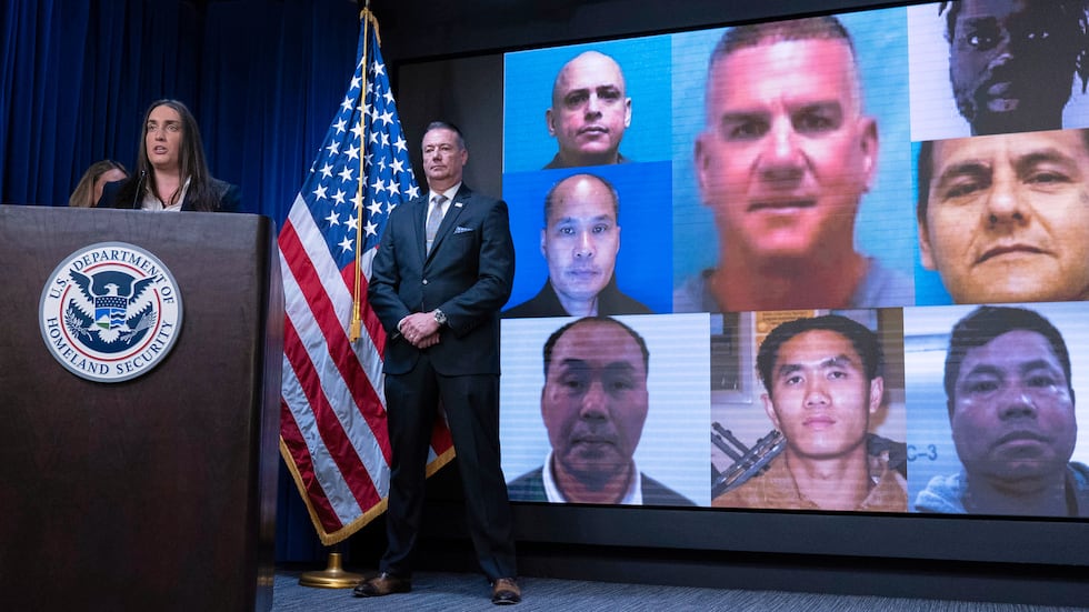 Deputy director of U.S. Immigration and Customs Enforcement Madison Sheahan, flanked by Acting...