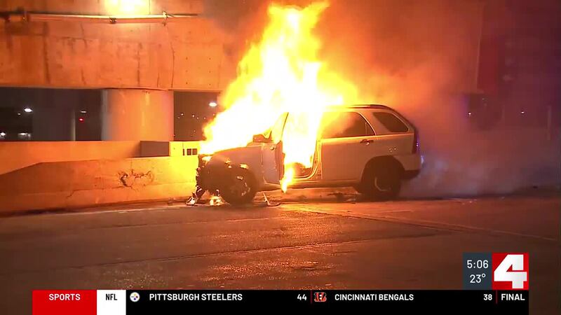 Downtown pursuit ends with vehicle fire, suspect at large