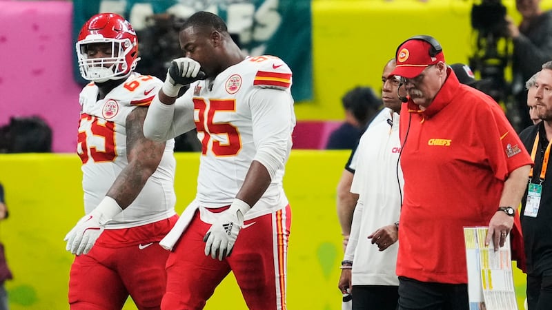 Kansas City Chiefs defensive tackle Chris Jones (95) walks off the field after an injury...