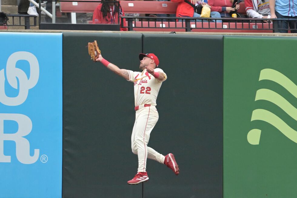 St. Louis Cardinals outfielder Michael Siani (22) makes a leaping catch during the ninth...