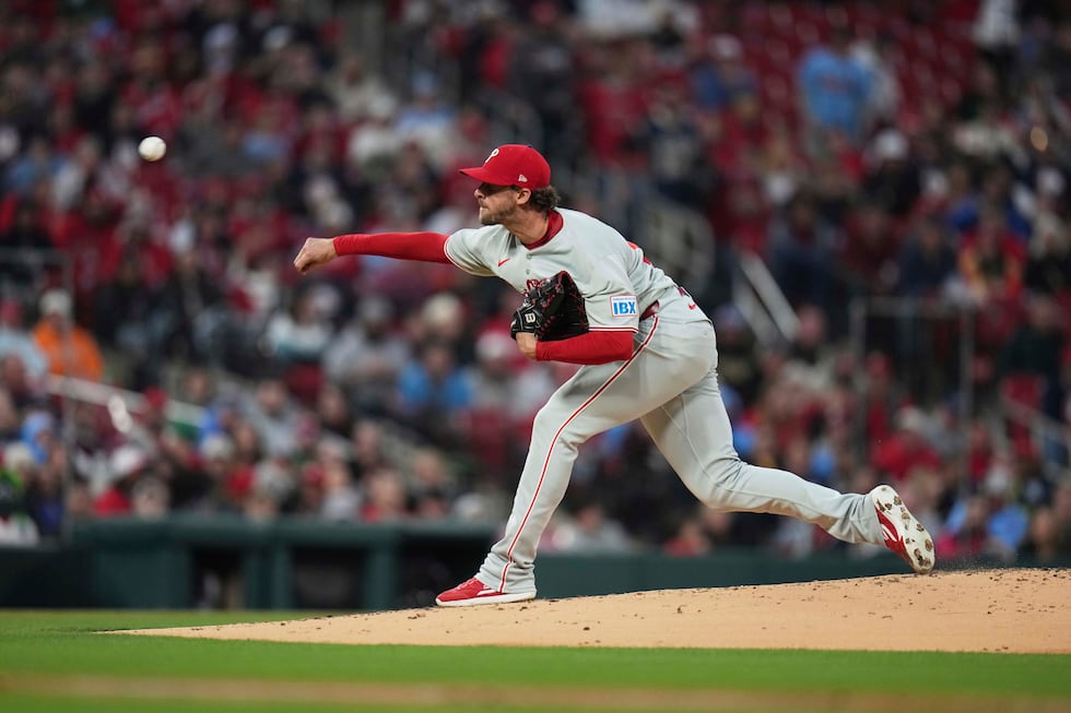 Philadelphia Phillies starting pitcher Aaron Nola throws during the first inning of a baseball...