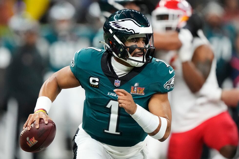 Philadelphia Eagles quarterback Jalen Hurts looks to throw against the Kansas City Chiefs...