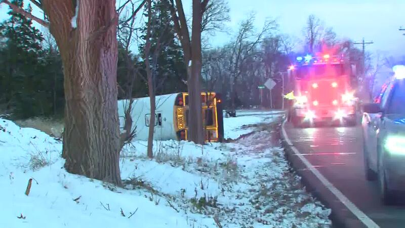 A school bus slid off the road and onto its side on Monday afternoon in St. Charles County.