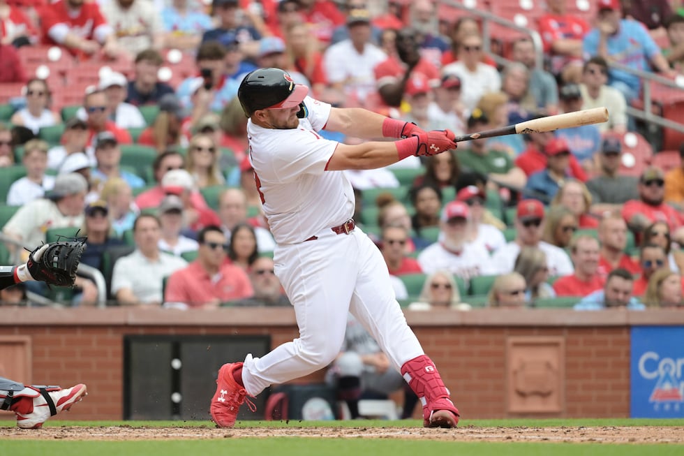 St. Louis Cardinals' Pedro Pagés hits a three-run home run during the third inning of a...