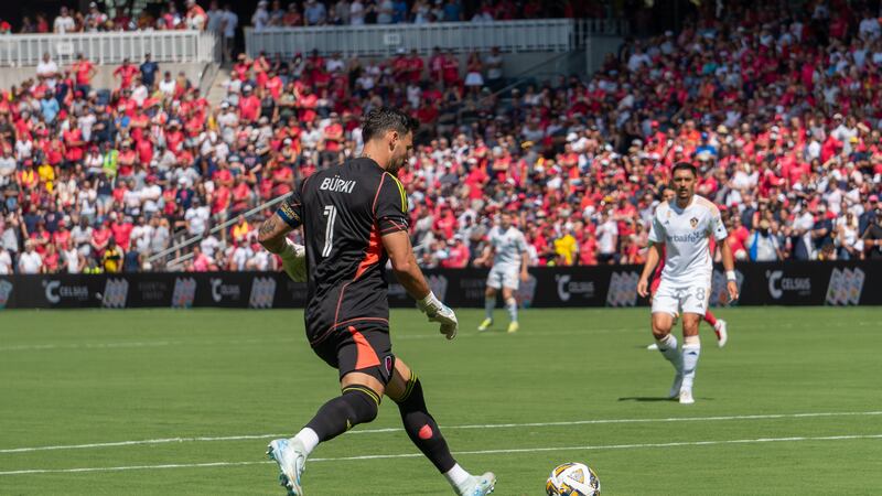 Roman Bürki plays a ball to a defender during a match against LA Galaxy.