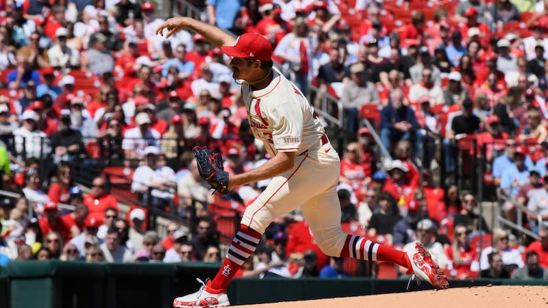 St. Louis Cardinals pitcher Miles Mikolas throws during the first inning of a baseball game...
