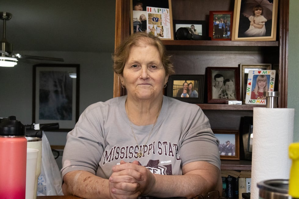 Disabled retiree Debra Lindsey sits in her home in Cave City, Ark. Before individual FEMA...