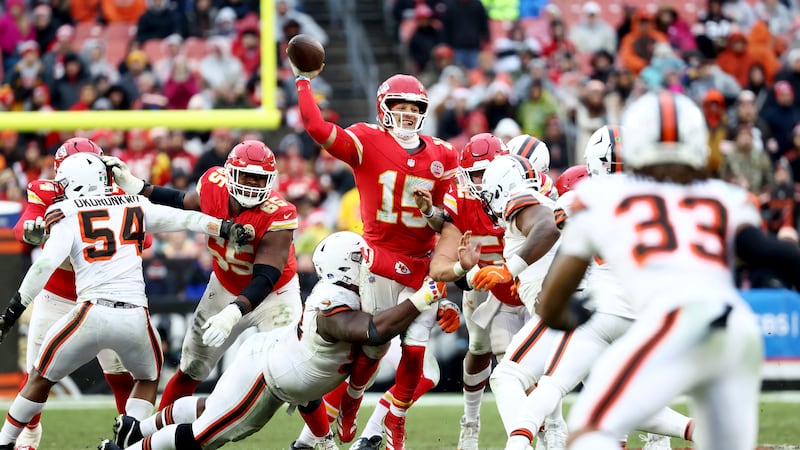 Kansas City Chiefs quarterback Patrick Mahomes (15) throws the ball during an NFL football...