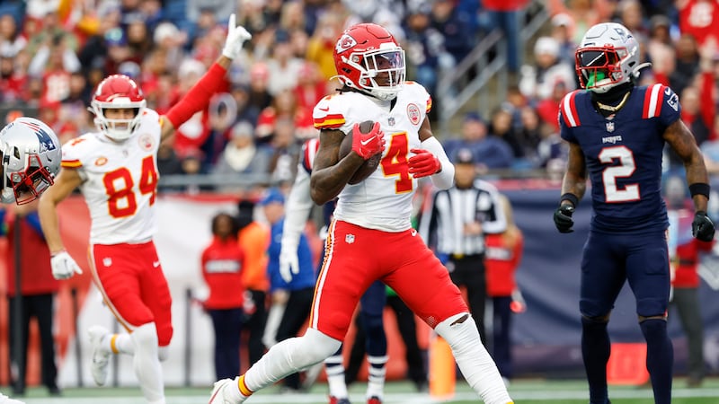 Kansas City Chiefs wide receiver Rashee Rice (4) steps into the end zone for a touchdown...