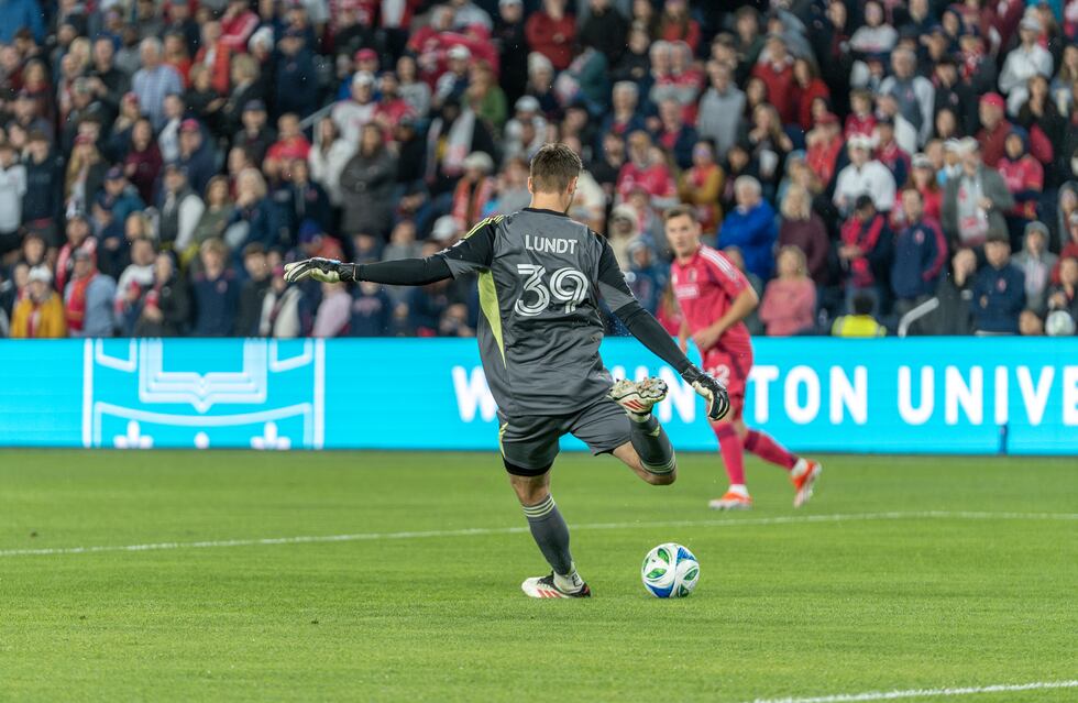 Goalkeeper Ben Lundt sends a ball against Seattle Sounders FC.