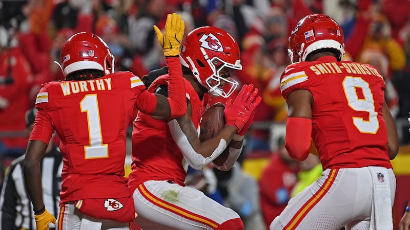 Kansas City Chiefs wide receiver DeAndre Hopkins (center) celebrates with teammates Kansas...