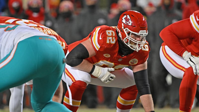 Kansas City Chiefs guard Joe Thuney (62) gets set on the line before a play during an NFL...