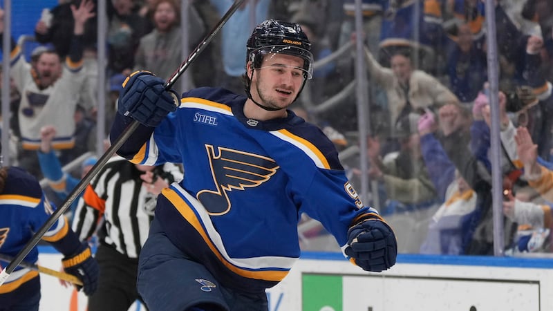St. Louis Blues' Alexandre Texier celebrates after scoring during the second period of an NHL...
